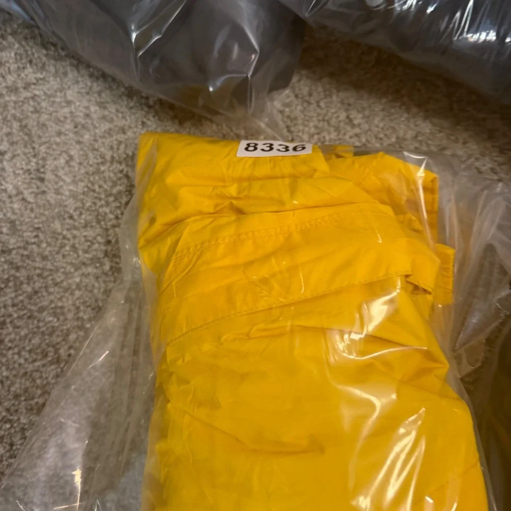The North Face Boys Yellow Resolve Reflective Waterproof Rain Jacket Size S 7/8